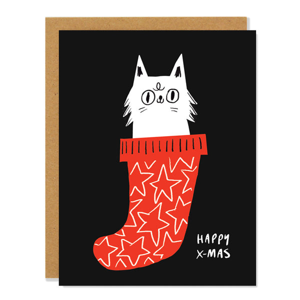 A Christmas card featuring a white cat with a surprised expression peeking out of a red stocking with white stars, and the text "HAPPY X-MAS" written in white at the bottom.