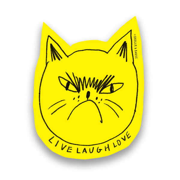 a yellow sticker featuring a grumpy cat's face and the handwritten text "LIVE LAUGH LOVE"