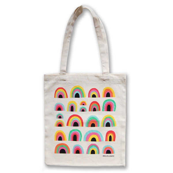 a tote bag featuring the classic badger & burke rainbow pattern in alternating colours