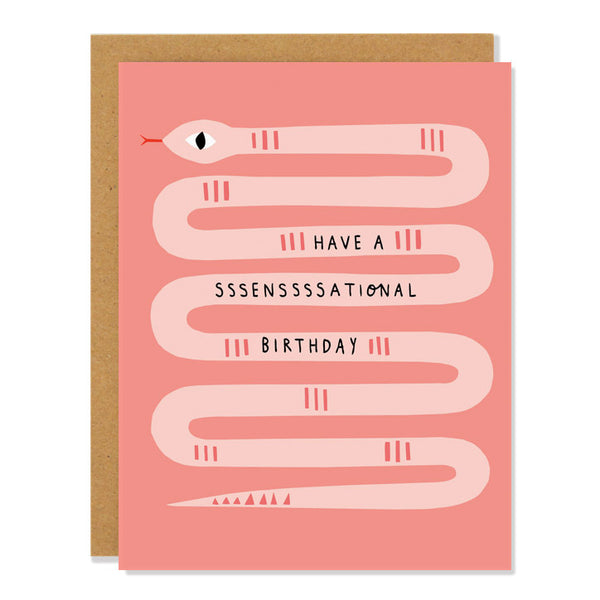 a birthday greeting card featuring an illustration of a coral colored long snake curves back and forth over the entire expanse of the greeing card. The text reads: "have a sssensssational birthday"