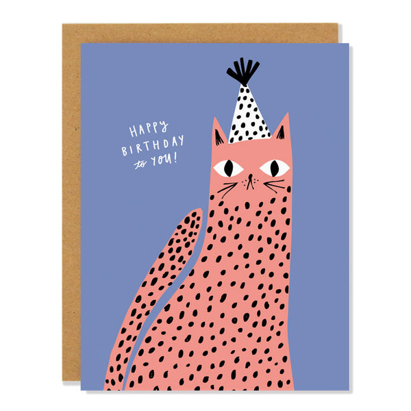 a birthday greeting card featuring a spotted coral cat wearing a party hat on a light blue background. The handwritten text reads: "Happy Birthday to You"