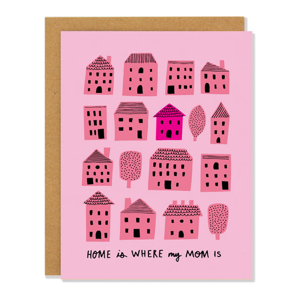 a mother's day greeting card in shades of pink, featuring a cutesy illustration of different houses and trees in rows and columns, with one house in a darker shade of pink. Text on the bottom of the card reads "Home is where my Mom is"