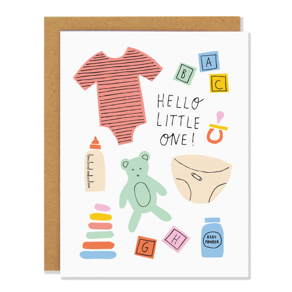 a new baby greeting card featuring illustrations of items associated with babies: diapers, baby powder, milk bottle, teddy bear, soother, a onesie, all in pastel colors. Text reads: Hello little one!