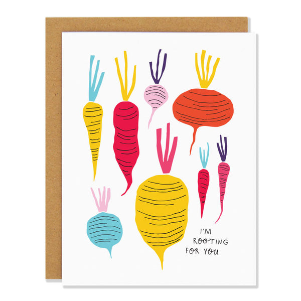 An encouraging greeting card featuring illustrations of various root vegetables in different colours on a white background. Text reads: I’m rooting for you.