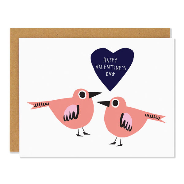 a valentine's day greeting card featuring illustrations of two coral and pink birds facing each other and a dark blue heart with the text "happy valentine's day"