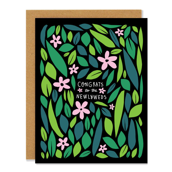 a wedding greeting card featuring a floral illustration in shades of green with light pink flowers on a black background. Text in the middle says "Congrats to the Newlyweds"