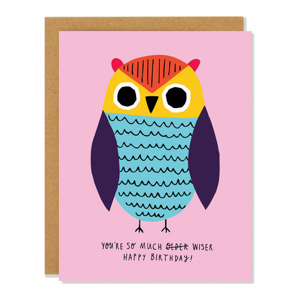 an illustration of an owl on a light pink background with the text reading "you're so much older, happy birthday" with "older" crossed out and replaced with "wiser"