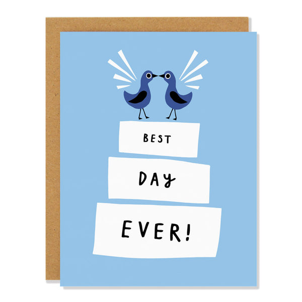 shades of blue, two birds beak to beak on top of white wedding cake, text reads "best day ever!"