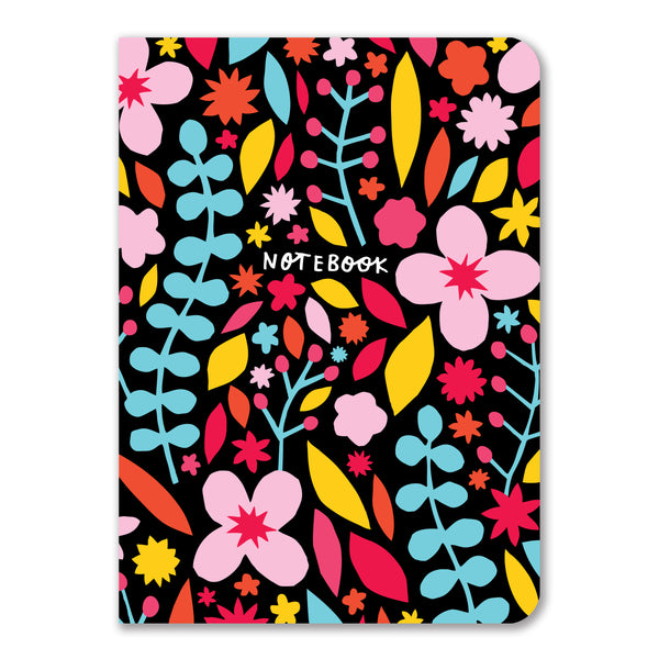 A notebook with a black cover featuring a colorful floral pattern with pink, red, yellow, and blue flowers and leaves. The word "NOTEBOOK" is written in white at the bottom center.