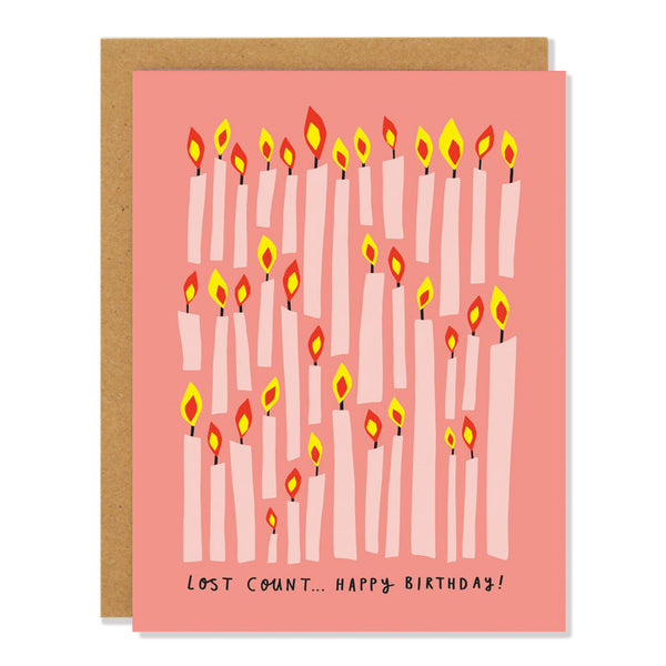 a birthday greeting card featuring an illustration of countless lit birthday candles, with the text "lost count... Happy Birthday!"