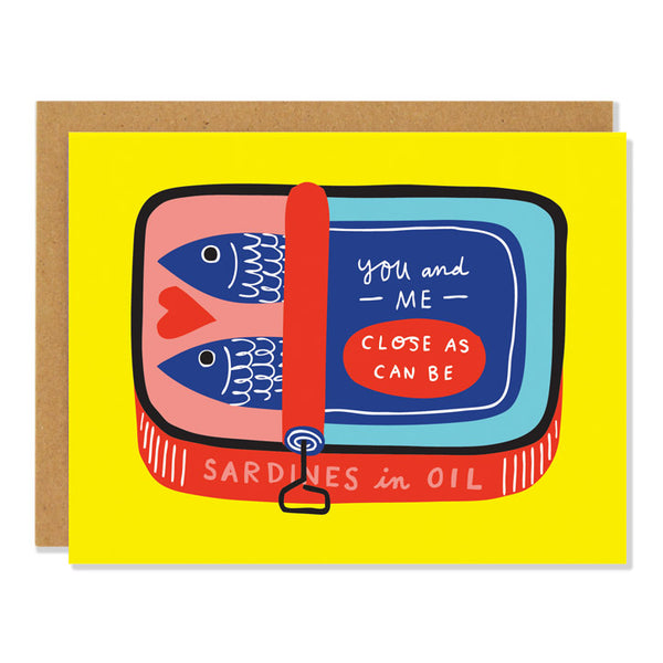 A love and friendship greeting card featuring an illustration of a sardine can in bright pop colours, yellow, blues, reds and coral. Two blue sardines inside the can have a red heart between them. Written on the can is the text: you and me, close as can be. 