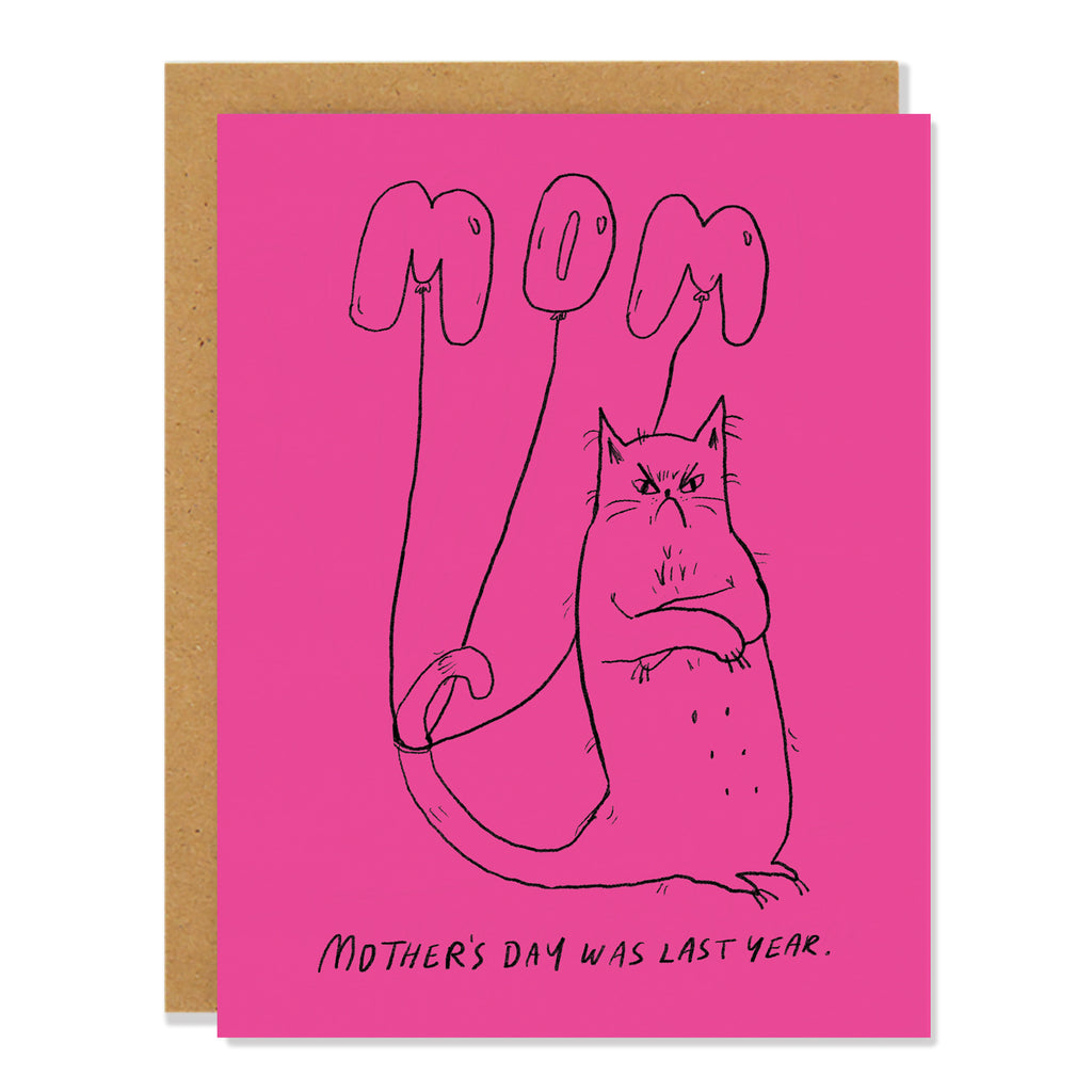 a mother's day greeting card featuring an illustration of a grumpy cat with folded arms on a pink background with text reading: "Mom, Mother's Day Was Last Year."