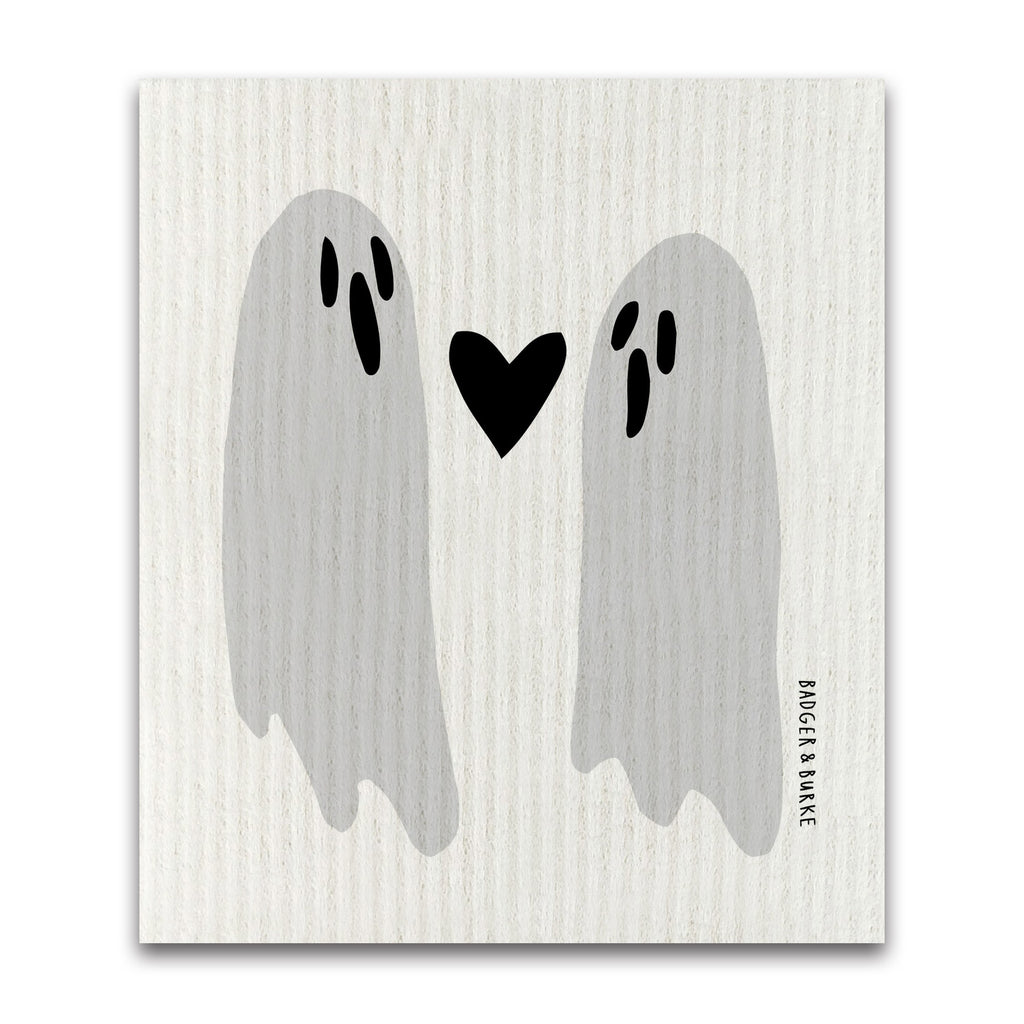 a swedish sponge cloth featuring an illustration of two ghosts with a black heart between them