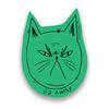 a green sticker featuring a grumpy cat's face and the handwritten text "GO AWAY"