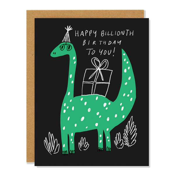 A birthday card with a green cartoon dinosaur wearing a party hat and holding a gift with the words "Happy Billionth Birthday to You!" written on a black background.
