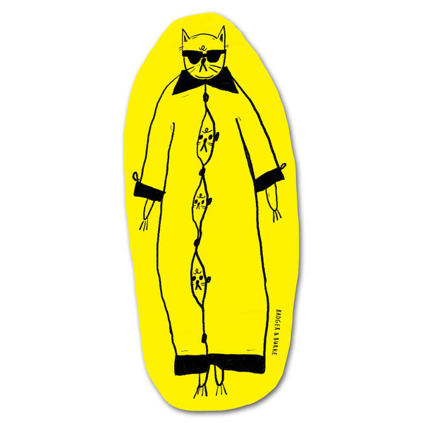 a yellow sticker featuring an illustration of a cat wearing sunglasses and a large trench coat, three kitten faces can be seen under the jacket