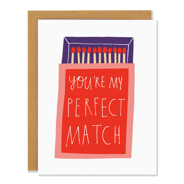a love and friendship greeting card with a simple paper cut out style illustration of an orange matchbox opened to a purple inside box containing 11 matches. The text on the box reads: "you're my perfect match"