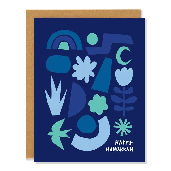 hanukkah card of blue cut out abstract shapes including a bird, flowers, circles, rainbows, stars in shades of blue