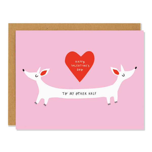 a valentine's day greeting card featuring an illustration of two dogs connected in the middle with text reading "Happy Valentine's Day - to my other half"