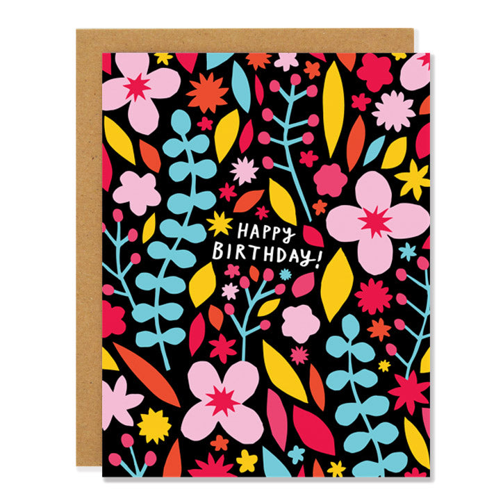 a birthday greeting card featuring an illustration of colourful floral designs on a black background, with text reading "Happy Birthday!"