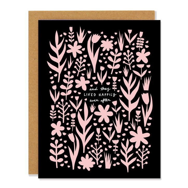 a wedding greeting card featuring an all over pink floral pattern on a black background. Text in the middle reads: "and they lived happily ever after"